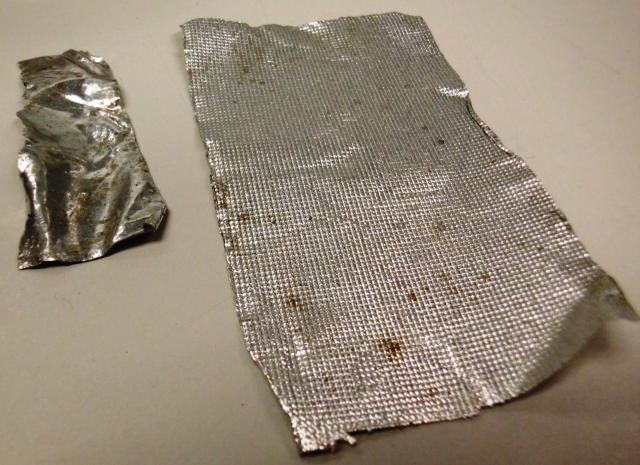 Underside of conditioned indium ribbons that had been in contact with the aluminum surface. 