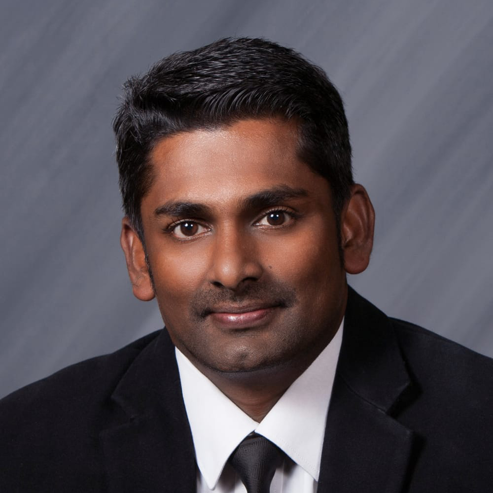 head shot of Damian Santhanasamy