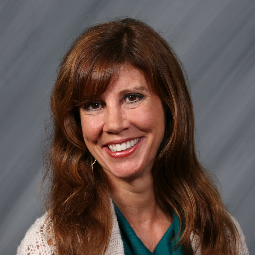 headshot of Delia Lara