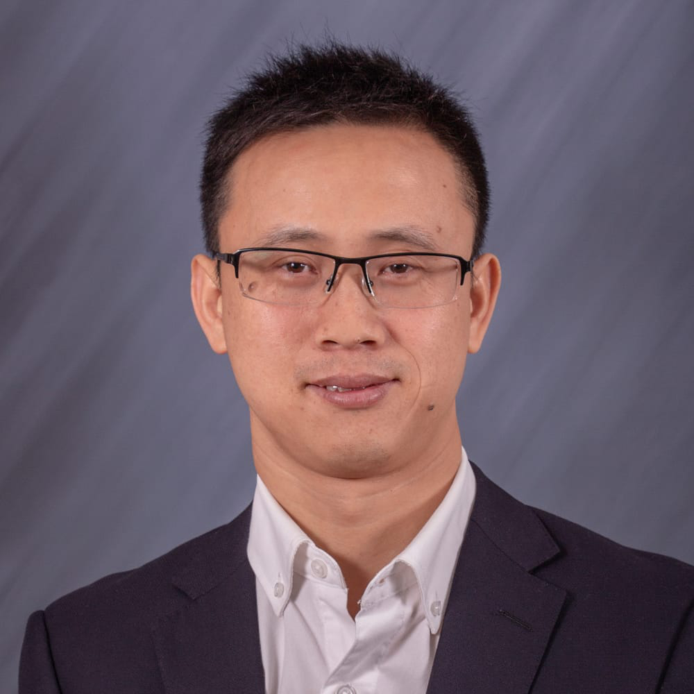 headshot of Geoff Wang