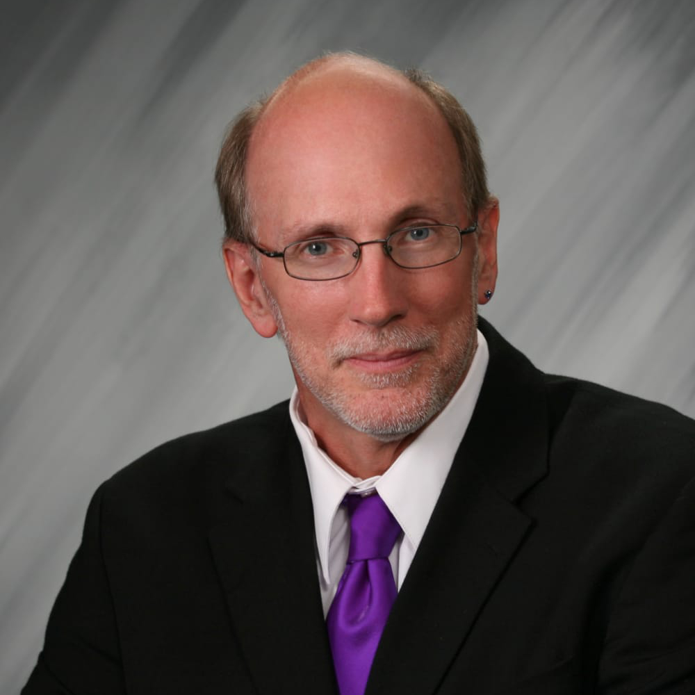 headshot of Ed Briggs