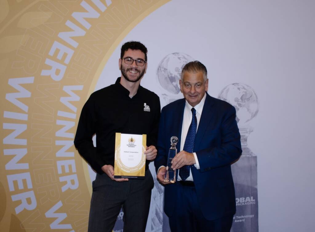Kevin Brennan accepting the Global Technology Award at SMTAi.