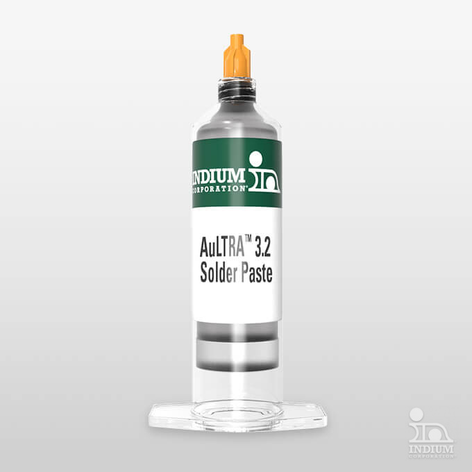 A syringe-like container labeled "AuLTRA 3.2 Solder Paste" with a green and white design, and an orange cap, standing upright on a clear stand.