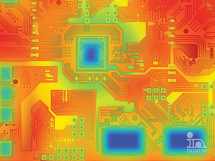 Thermal image of a circuit board showing heat distribution with red, yellow, and blue areas indicating temperature variations in electronic components and pathways.