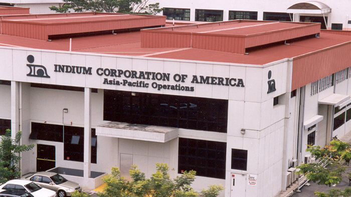 A building with a sign reading "Indium Corporation of America, Asia-Pacific Operations" on the front.