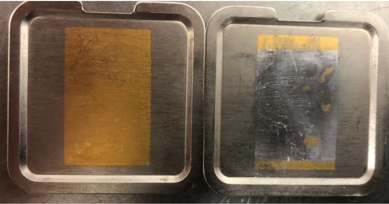 NIG-plated copper lid test vehicles with selectively plated immersion gold flash in the center. Indium solder after reflow, removed from the chip. The solder material wet to the gold-plated surface and did not extend out to the nickel-plated surface. 