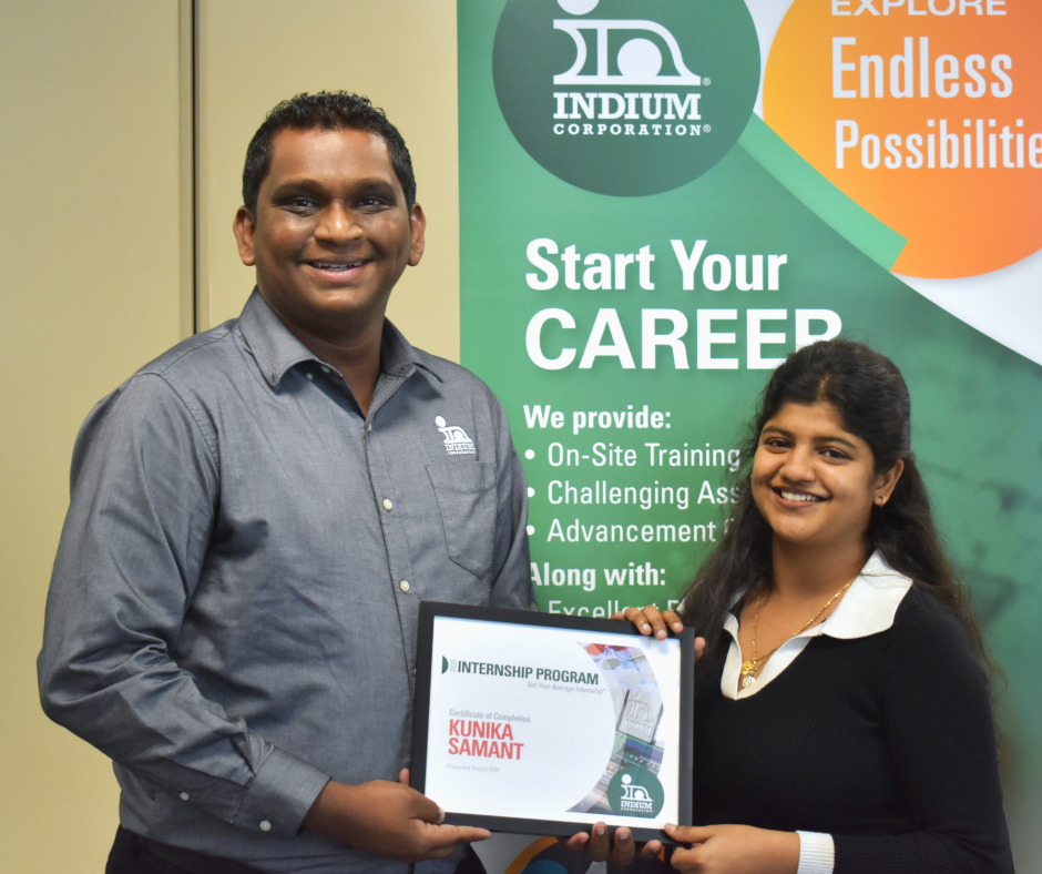 Indium Corporation intern and her supervisor at her commencement ceremony.